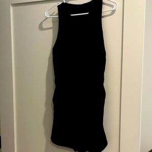 Banana republic black dressy romper with tie around waist. Zips in back.